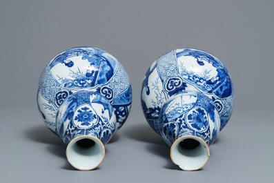 A pair of Dutch Delft blue and white double gourd chinoiserie vases, 18th C.